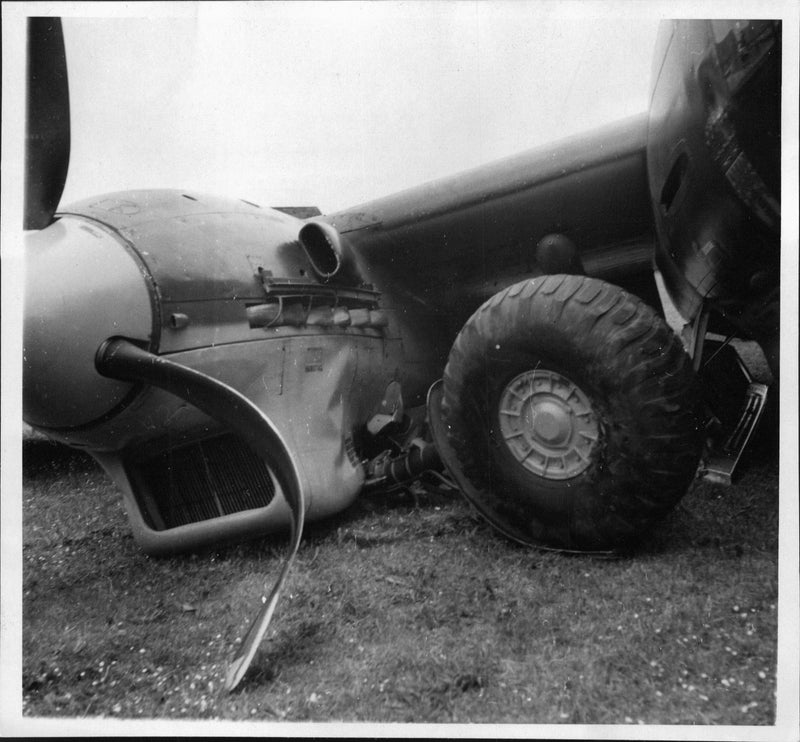 Wrecked airplane with a damaged propeller - Vintage Photograph