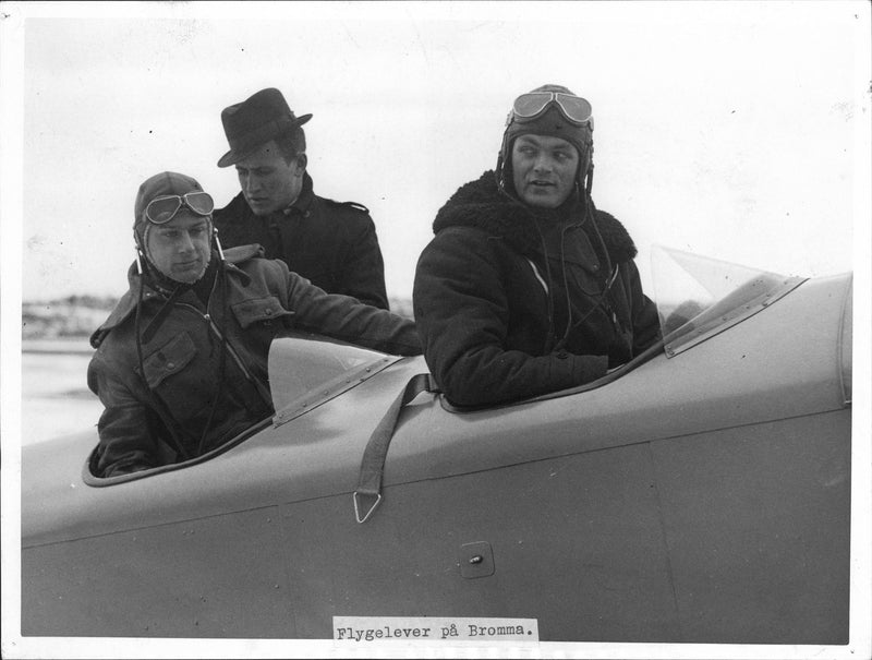 Aviation students during a practical lesson in Stockholm flight club's Kremm Plane at Bromma airfield. - Vintage Photograph