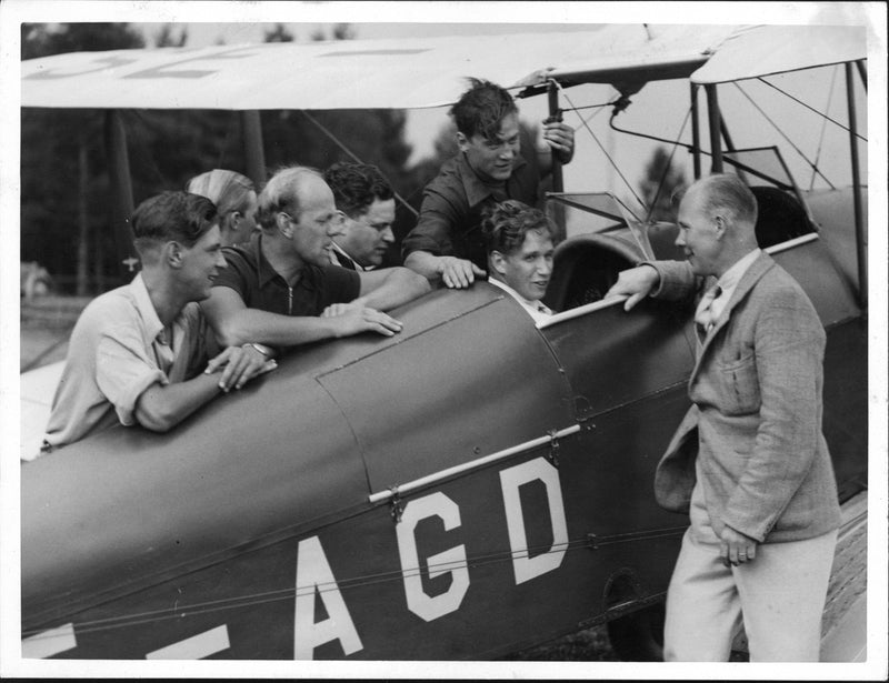 Aviation teacher Hugo Fredriksson and his talented pupils at the aviation boarding school at Stigtomta airfield. - Vintage Photograph