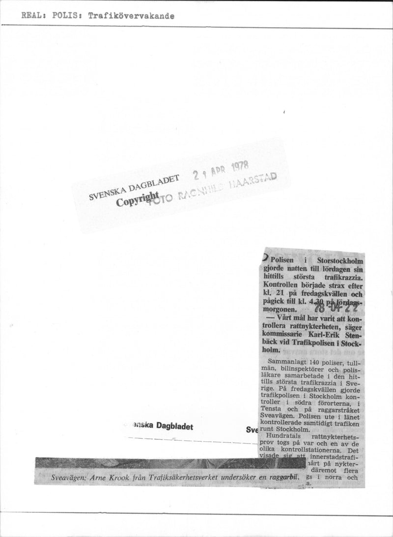 Arne Krook from the Safety Office examines a hot rod on SveavÃ¤gen: - Vintage Photograph