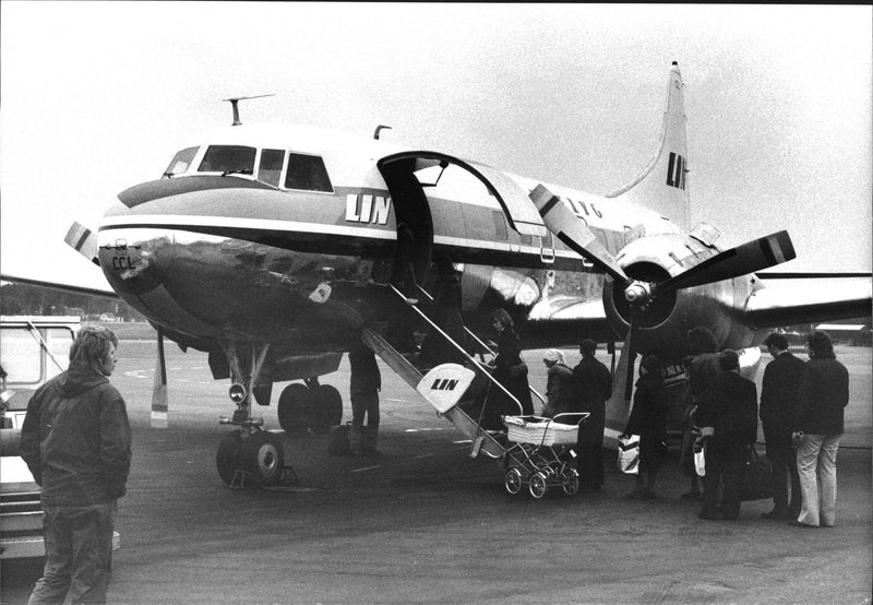 Passengers boarding an aircraft. - Vintage Photograph