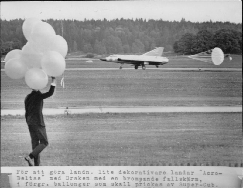 Acro Deltas lands with J 35 Dragon with a parachute parachute. - Vintage Photograph