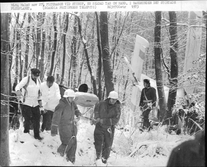 Aviation accident outside Sturup - One of the injured carried away from the crashed plane - Vintage Photograph