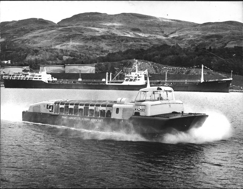 A Denny's D-2 hovercraft in passenger traffic on the River Thames in London - Vintage Photograph