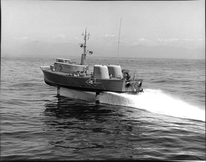 The high-speed patrol boat, High Point, is in high speed in the Pacific Ocean - Vintage Photograph