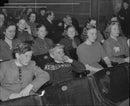 The audience views a school concert. - 23 April 1944 - Vintage Photograph
