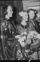 Girls selling paper flowers at the Chinese soirÃ©e at the Concert Hall in Stockholm - 21 February 1944 - Vintage Photograph