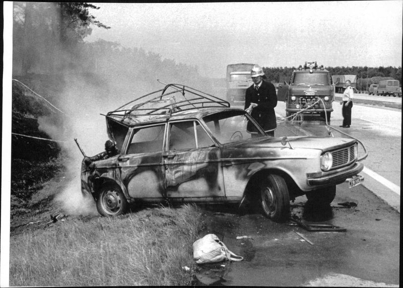 Severe collision where the bee and the truck where the car's gas tank was on fire with six people inside burned - Vintage Photograph