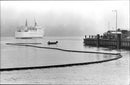 160 000 liters of oil leaked from the tanker Petro Tank at Värtakajen, seen here booms to prevent the oil from spreading. - Vintage Photograph