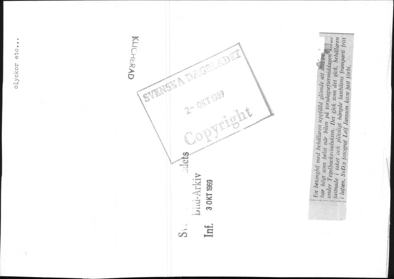 A concrete mixer with raised container stuck with container ceiling over Brick hill viaduct - Vintage Photograph