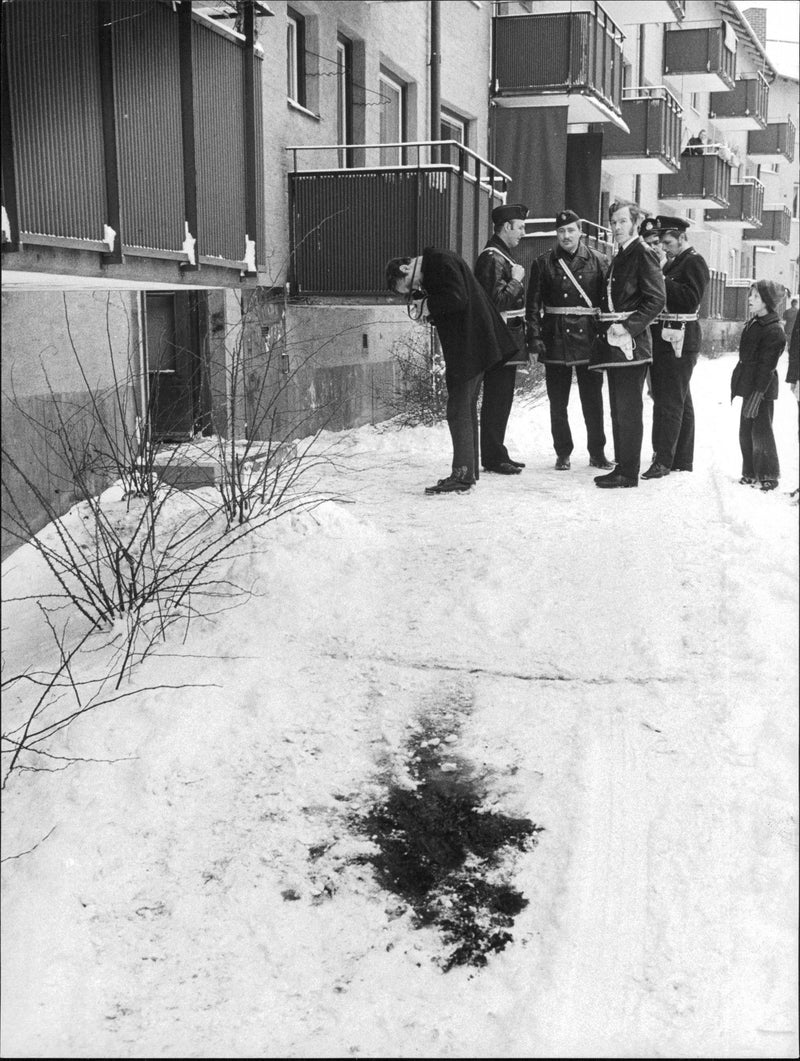 Police at the scene where the woman in 40s shot by her husband. Blood Trails visible in the snow. - Vintage Photograph