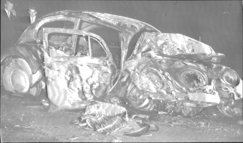 The Volkswagen car was completely destroyed by the collision and the fire - Vintage Photograph