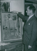 The teacher Blomqvist shows a painting from Bromma concert. And lecture association exhibition at Nationalmuseum - 19 November 1944 - Vintage Photograph
