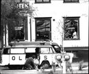 Armed hostage in pharmacies, the police took cover behind police cars - Vintage Photograph