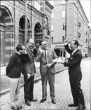 In front of the missionary party&