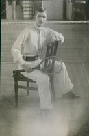 Prince Erik, Duke of VÃ¤stmanland and the son of Gustav V, posing with a tennis racket. - Vintage Photograph