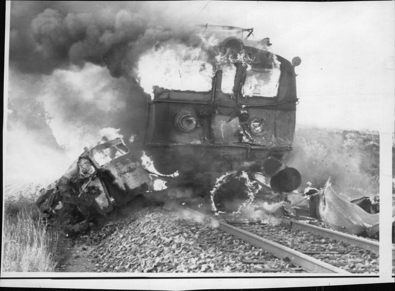 Violent collision between an electric locomotive and a tanker truck that ended in a fierce fire - Vintage Photograph