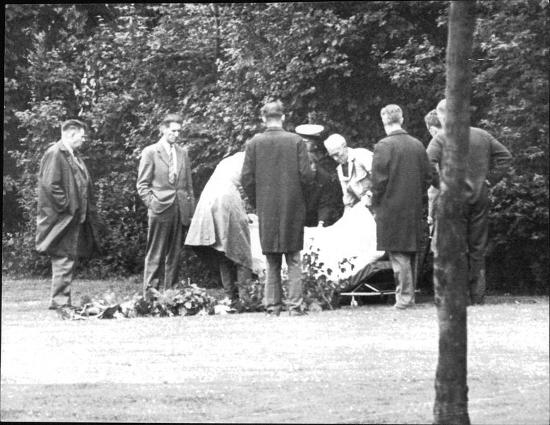 Officers investigating the accident site where a murder committed - Vintage Photograph