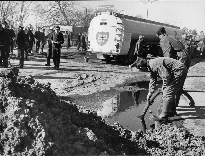 Tank car hit around and half of the load with 30,000 liter diesel oil ran out - Vintage Photograph