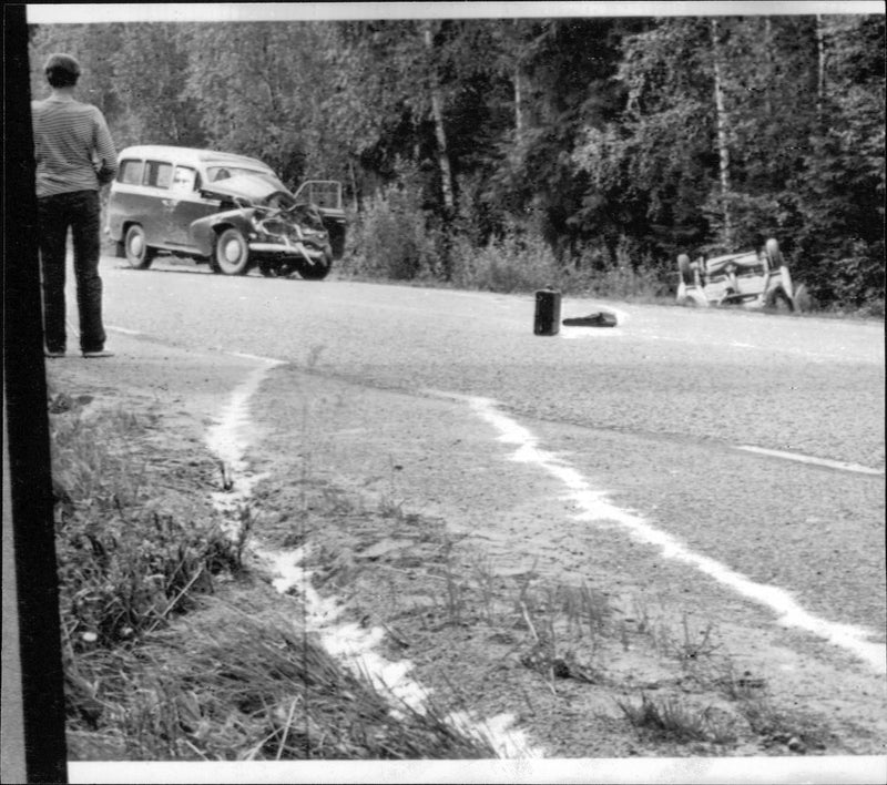 Varmland Damaged Cars by frontal collision. One car on the roof at the side of the road. - Vintage Photograph