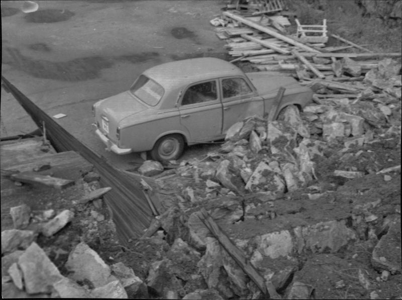 Parked cars almost hit the rocks after the race from Otter rock in Gothenburg - Vintage Photograph
