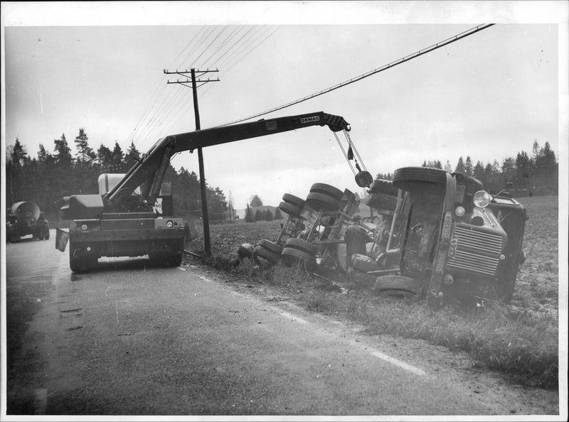 Crane is salvaging the oats conditioned tanker in the ditch - Vintage Photograph