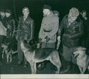 People search party with dogs gathered at Högdalens subway station. - Vintage Photograph