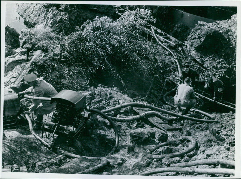 Oil is pumped into the tanker - Vintage Photograph