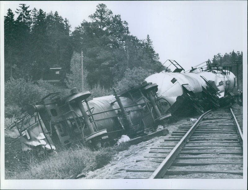 Eight tank cars derailed and overturned in the accident between Trangsund-rapids, on Nynäsbanan. The carriages blocked the single track line and was a fire hazard. - Vintage Photograph