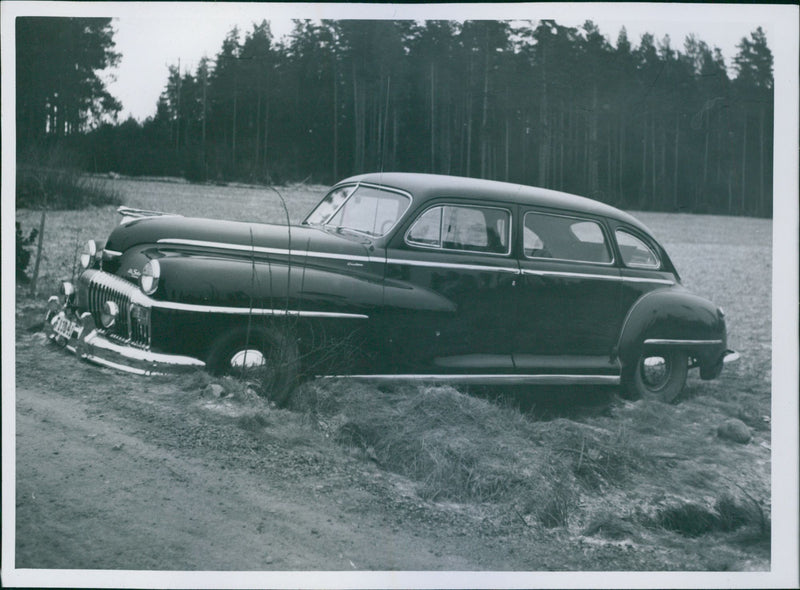 The abandoned car after the driver's murder was found at a field - Vintage Photograph