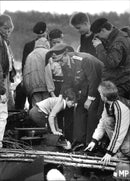 Little Prince Carl Philip inspecting a tank with father King Carl Gustaf help - Vintage Photograph