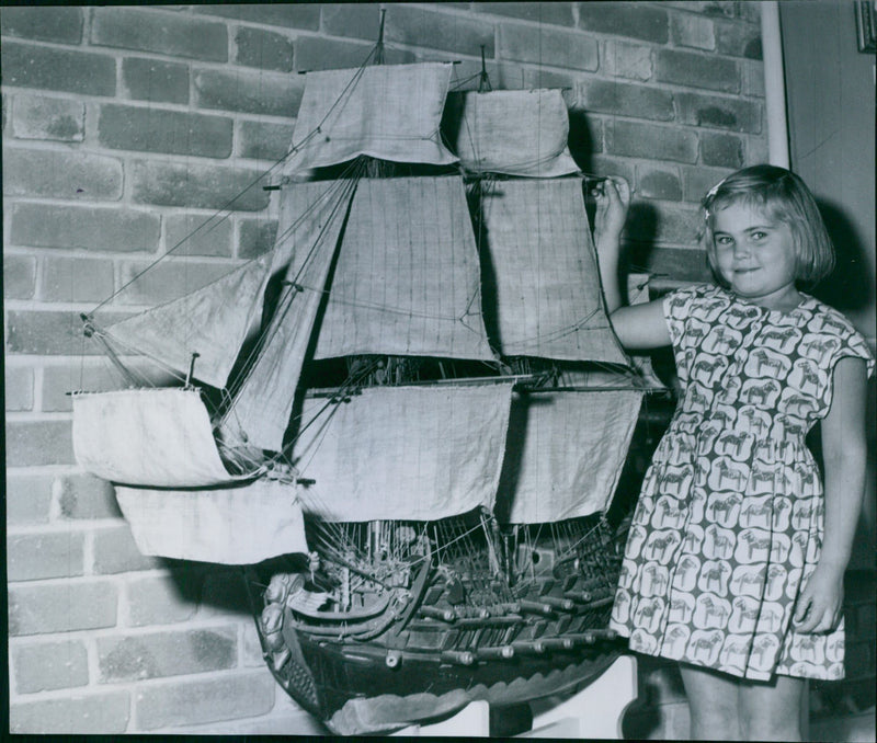 Barbro Zakrisson with a votive ships from the 1700s to the exhibition "BrÃ¤nnkyrka in the past and present" in LÃ¥ngbrodalsvÃ¤gen elementary school. - 25 September 1949 - Vintage Photograph