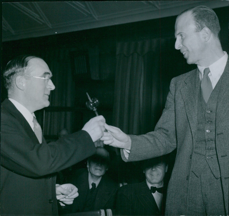 Gunnar Beskow handing over the gavel to Stellan Arvidsson in the Swedish Writers' Association annual meeting. - Vintage Photograph