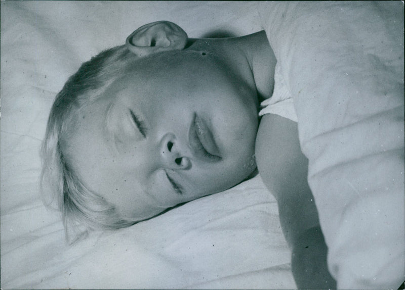 Rediscovered 3-year-old. Runaway Ingemar slept well after the day-long walk in the woods. - Vintage Photograph