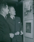 Svante Lundgren, winner of this year's MÃ¤startÃ¤vlan, and Ulf Hard af Segerstad under "Fotos mÃ¤startavlan" in the Concert Hall. - 17 November 1948 - Vintage Photograph