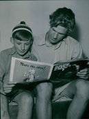 Engelsman John Edwards reads an English magazine with Swedish Alf Ronngaard during English-Swedish poetry at the Sigtunaskolan - 31 July 1946 - Vintage Photograph