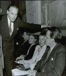Jan FridegÃ¥rd, Madam and Mr. Ahlin, in conversation about autobiography in the Concert Hall - 18 September 1947 - Vintage Photograph