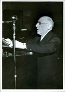 International Statistical Institute 30th Session of the Concert Hall. The statistician and Frenchman Henri Bunle the rostrum. - Vintage Photograph