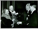 Queen Louise and the King Gustaf Adolf welcomed with flowers by Jonzon at the Academy of Music's anniversary. - Vintage Photograph