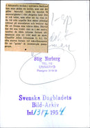 Driver Allan Johansson (right) shows interested passengers two pine trees that have grown together. - Vintage Photograph