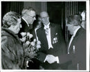 Queen Louise, King Gustaf Adolf greets Nils Molin in the company of Brother Jonzon at the Academy of Music's anniversary. - Vintage Photograph