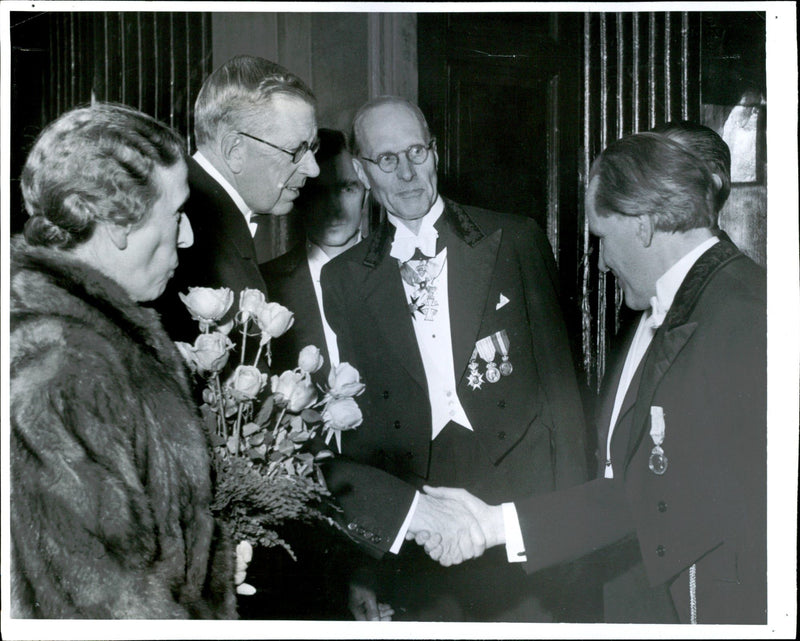 Queen Louise, King Gustaf Adolf greets Nils Molin in the company of Brother Jonzon at the Academy of Music's anniversary. - Vintage Photograph