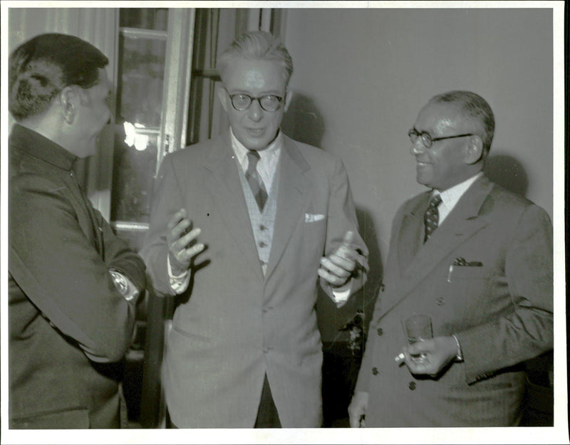 Indian legation. The Indian writer Raja Rao along with Generaldir. Richard Sterner and Indian minister MJ Desai - Vintage Photograph