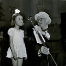 Little girl sings at the Christmas party at the Concert Hall - 9 December 1945 - Vintage Photograph