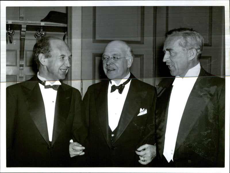 G. Brochmann, Henning, and Sjoberg Swiss Moeschlin in conversation over dinner with the Swedish Writers' association - Year 1938 - Vintage Photograph