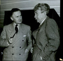 From the poet's conference in Sigtuna. Harry Blomberg in conversation with Dr. Axel Gauffin - 22 September 1942 - Vintage Photograph