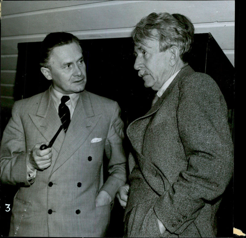 From the poet's conference in Sigtuna. Harry Blomberg in conversation with Dr. Axel Gauffin - 22 September 1942 - Vintage Photograph