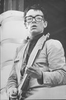 Elvis Costello plays guitar - Vintage Photograph