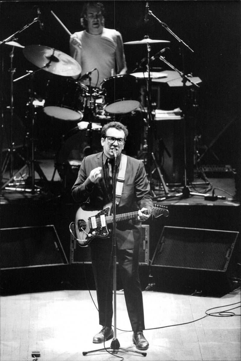 Elvis Costello & The Attractions occur in the Stockholm Concert Hall - Vintage Photograph
