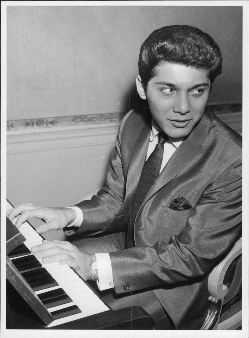 Paul Anka plays the piano - Vintage Photograph